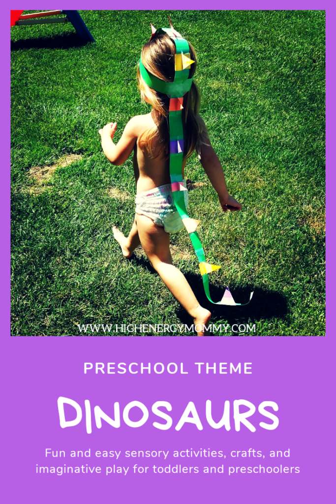 data-pin-description= dinosaur preschool theme activities with image of toddler running on grass in diaper with paper dinosaur hat and tail with colorful spikes