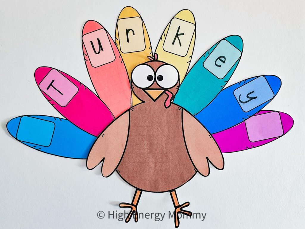cute turkey crafts for kids paper turkey with feathers that spell TURKEY for name practice activity