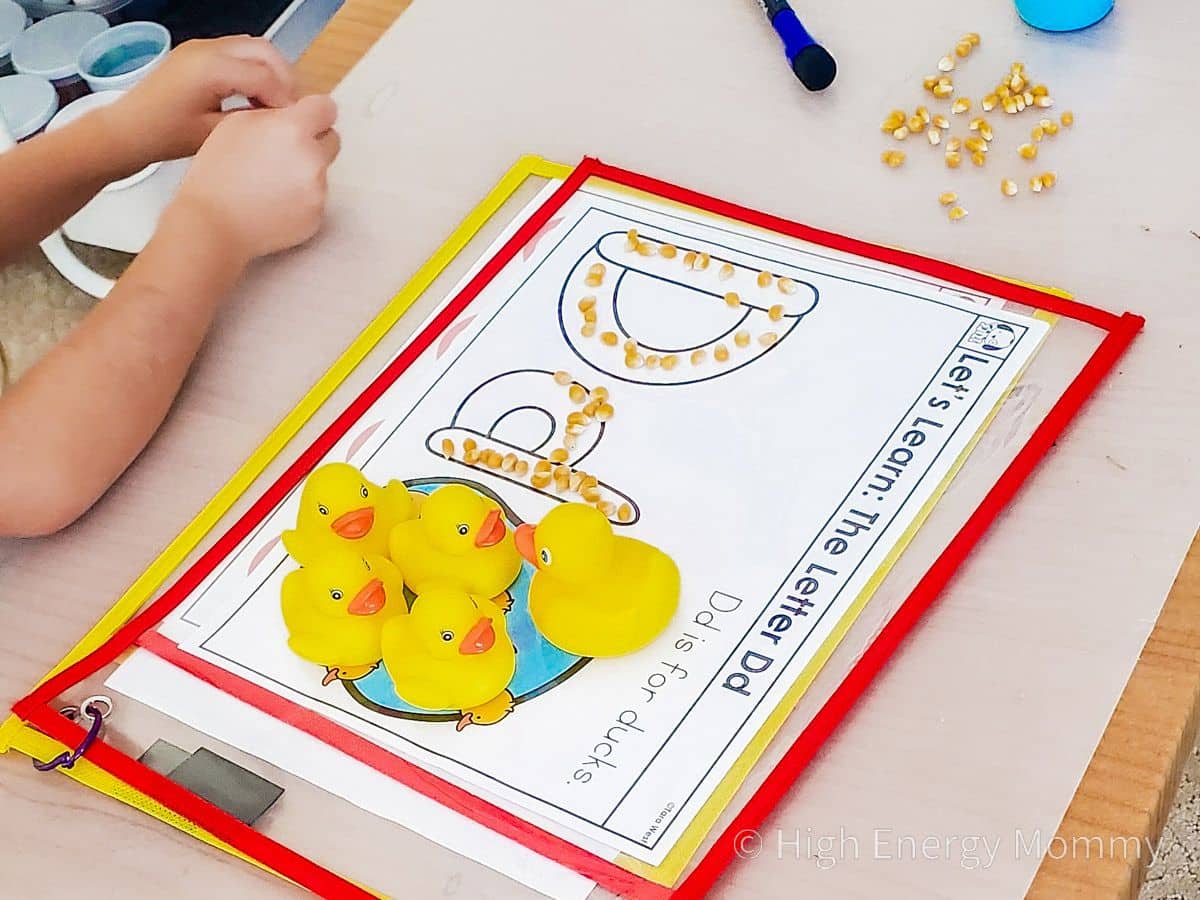 Desk with mat with the letter D and rubber Ducks