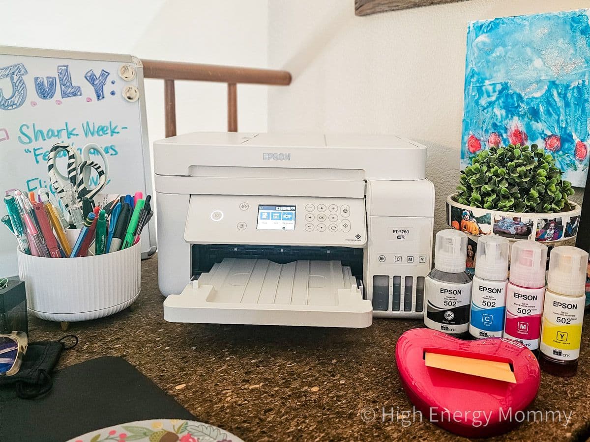 Epson printer on a brown desk